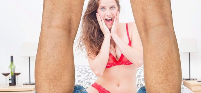 woman surprised by the increase in size of a man's penis photo 2